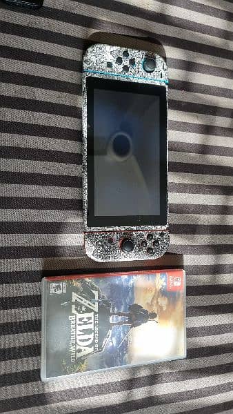 Nintendo Switch with Dbrand skin + 2 games + GC Controllers 6