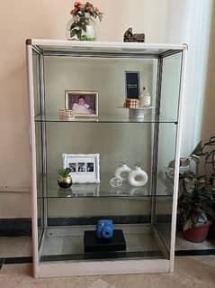 glass table and rack of aluminium for decoration