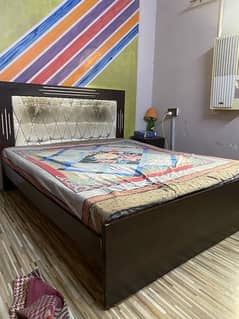 Queen size bed wooden