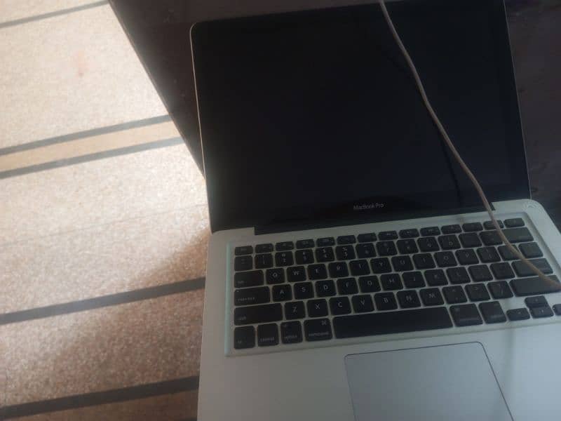 Apple Macbook pro 2012 Mid with original charger 1