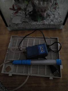 Aquarium for sale small size with airpump  price slightly negotiable