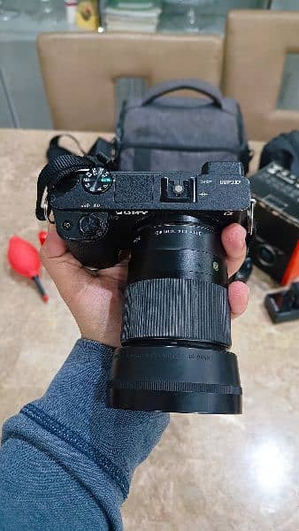 Sony A6400, with 16-55 mm lens and Boya wired mic 2