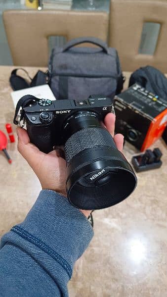 Sony A6400, with 16-55 mm lens and Boya wired mic 5