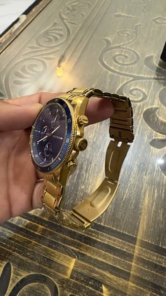 Tommy Hilfiger Men’s Gold Stainless Steel Blue Dia 5