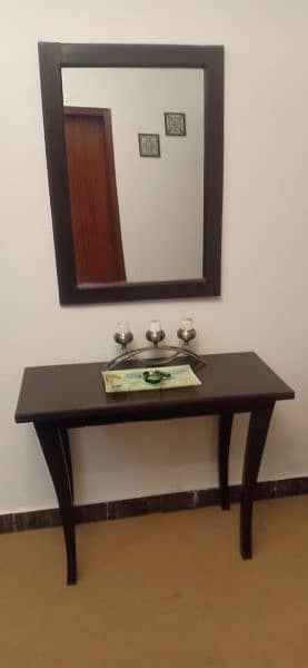 Mirror and table 0