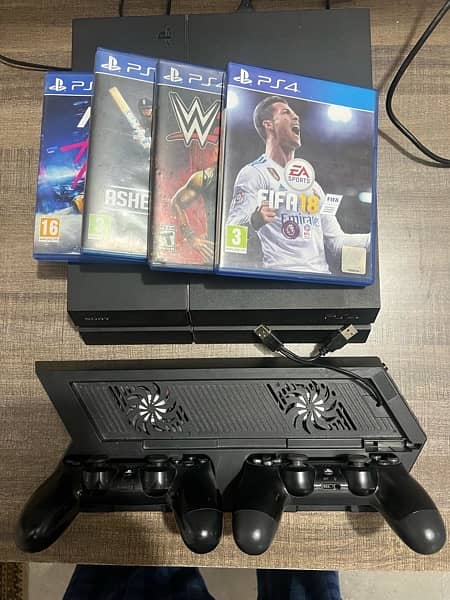 PS4 with 2 Controllers & Games 1