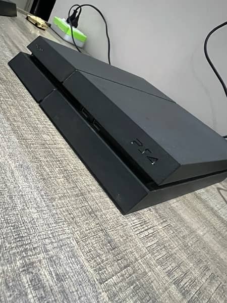 PS4 with 2 Controllers & Games 2