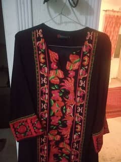black raw silk shirt with heavy embroidery