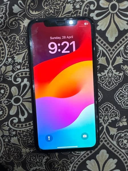 Iphone xr 64gb 77% health with charger only 1