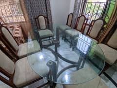 8 chairs n Glass Table