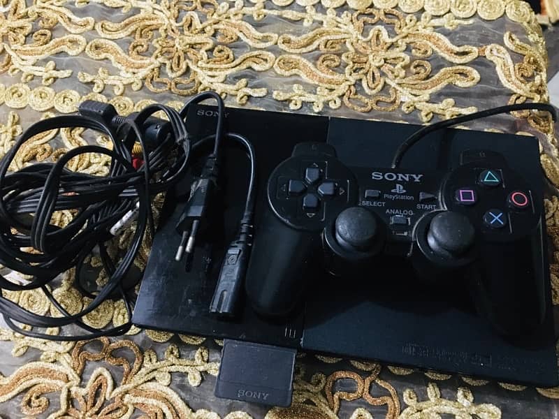 ps2 slim with all accessories and memory card new condition 10/9 0