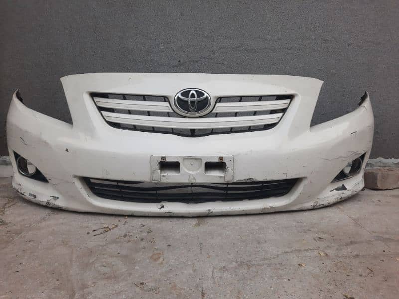 Toyota Corolla 2009 2010 2011 White front bumper with lights for sale 0