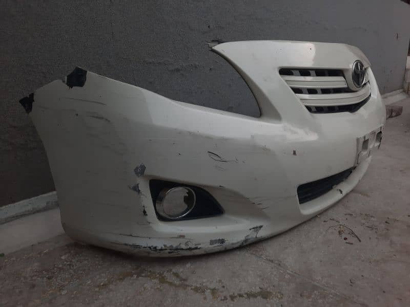 Toyota Corolla 2009 2010 2011 White front bumper with lights for sale 1