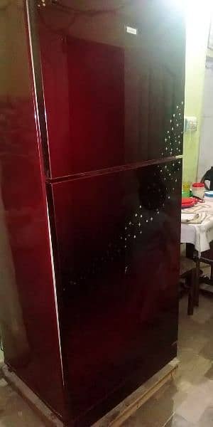 pel refrigerator red colour new condition 1