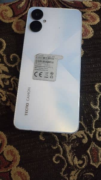 Techno camon 19 neo with 6gb Ram and 128 Rom,  charger and also box. 1