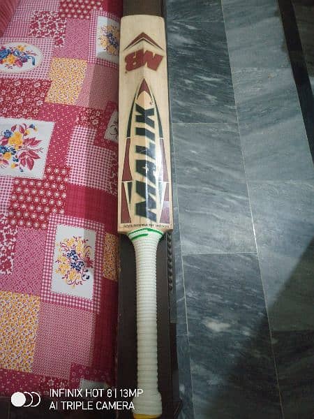 MB Malik Gold edition cricket bat. 4