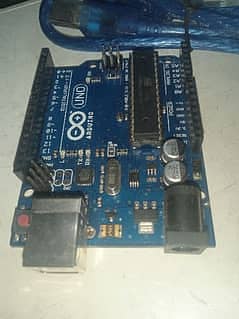 Arduino Uno R3 with bread board and wires.