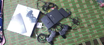 PlayStation 2 with 2 controlles