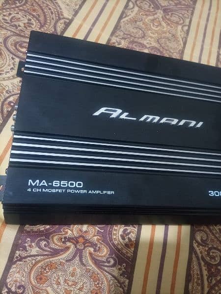 1. kanwood woofer with box and 4 channel amplifair no repair 0