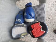 boxing gloves, punching bag and practice form
