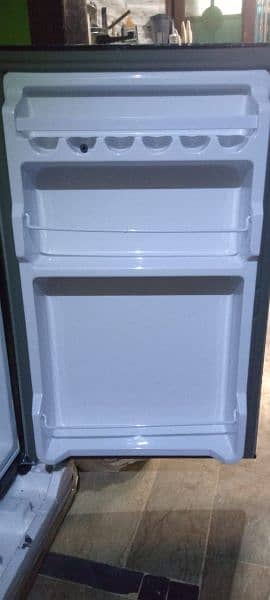 just 2 month use room refrigerator Dawlance 9101 looking brand new 9