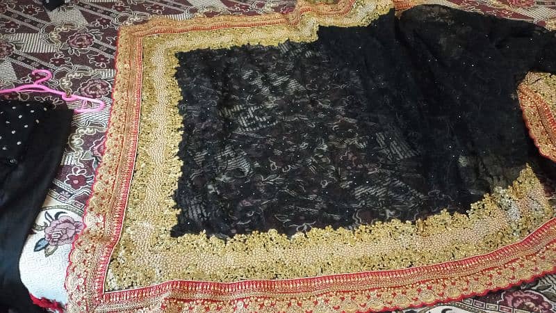 black embroidry net saree 5