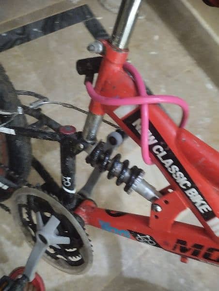 A bicycle for good kids is in good condition 5