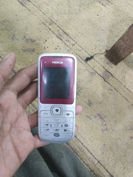 Nokia c1 ok set Hai singer Sim memory card bhi lagta hai 1
