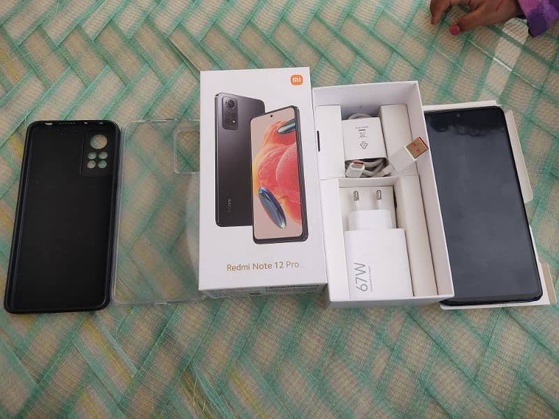 Redmi Note 12 pro with genuine 67W charger and imie match box 10 by 10 1