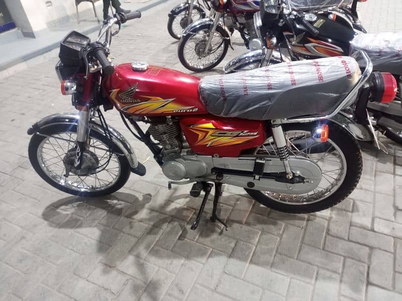 Honda 125 , mdl 2021, lush condition, all Punjab number, cmplte docmts 1