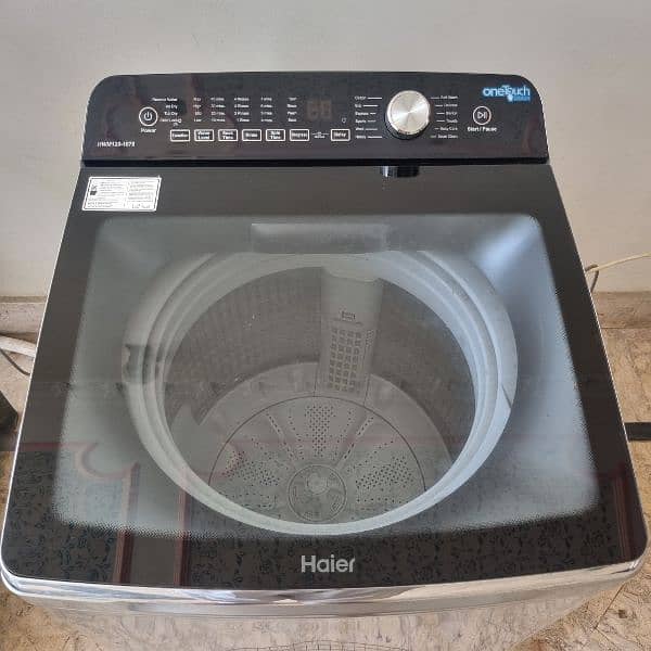 Haier washing machine. New model.  very less used. like new 1
