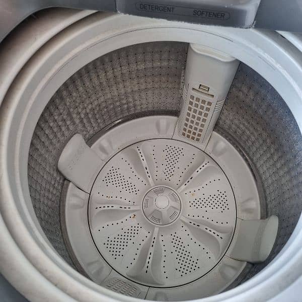 Haier washing machine. New model.  very less used. like new 2