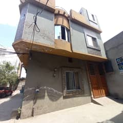 2.5 marla Double story corner house for sale in amir Town Harbanspura Lahore 0