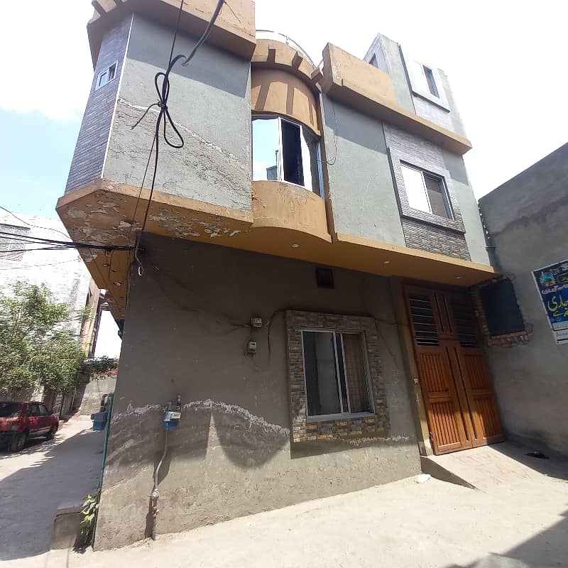 2.5 marla Double story corner house for sale in amir Town Harbanspura Lahore 0