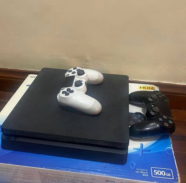 PS4 with 2 original controllers and 7 good games 2