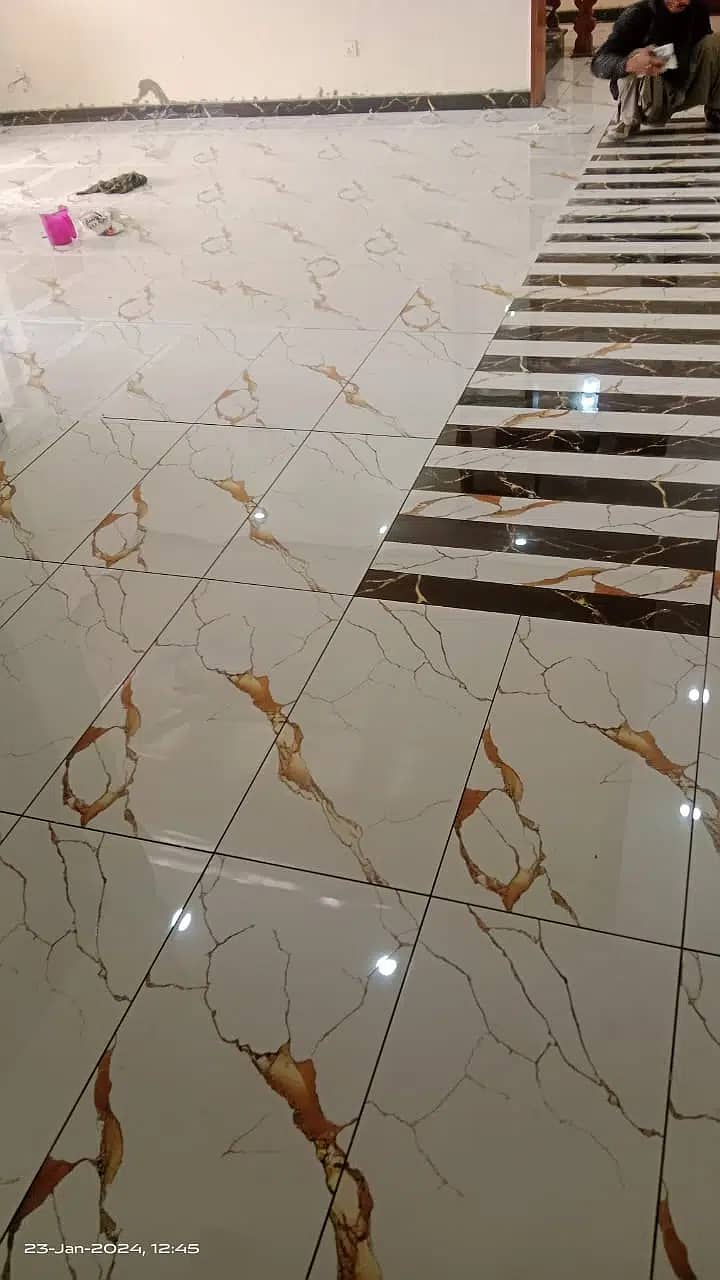 Tiles fixing marble fixing chips work Regrai polish and All works 3