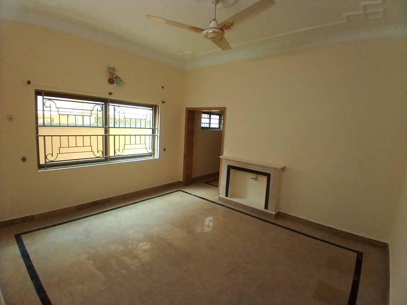 beautiful unfurnished Ground portion with big garden and ample parking 3