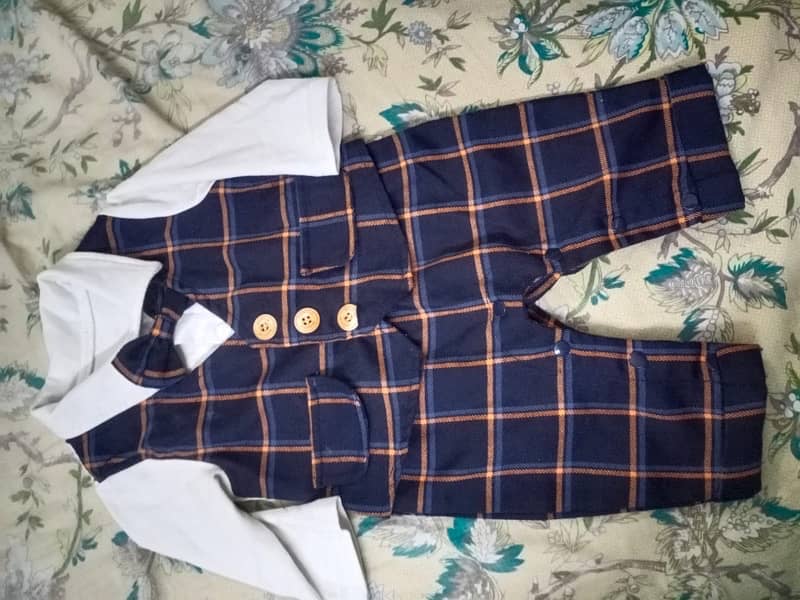 1 year baby boys dresses in a very good condition 1