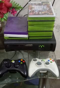 Xbox 360 with 2 controllers with 16 DVD in very good condition