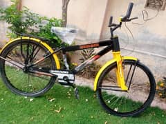 26 INCH CICAGO FRAME ALMOST NEW CONDITION YELLOW AND BLACK COLOUR FRAM