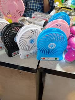 Mini rechargeable Fan with USB charging Cable.