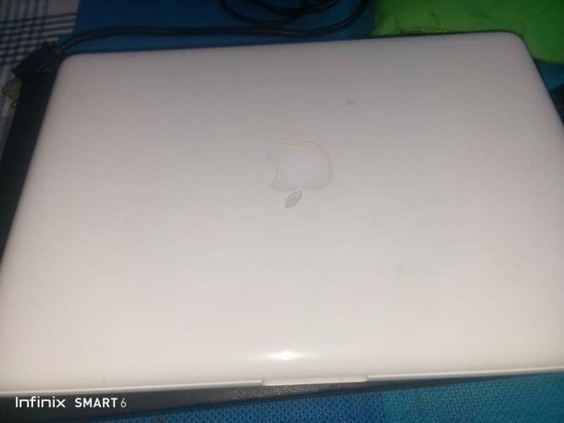 MacBook mid white best condition | selling due to emergency 0