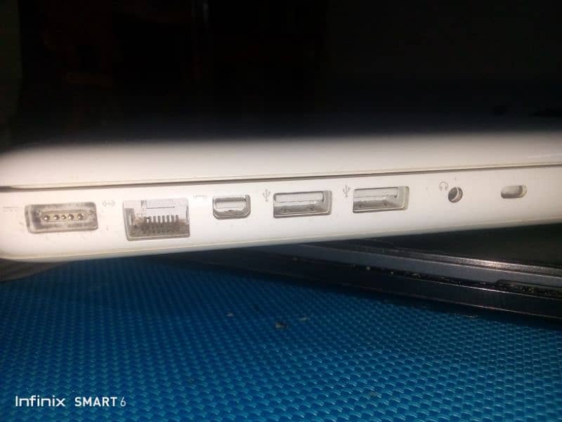 MacBook mid white best condition | selling due to emergency 4