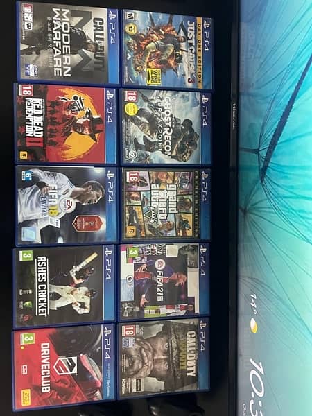 PS 4 SLIM 500 GB Four Controllers and 10 games 5