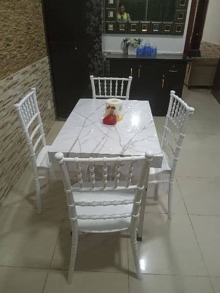 I'm selling dining table and four chairs 10/10 only 35000 5