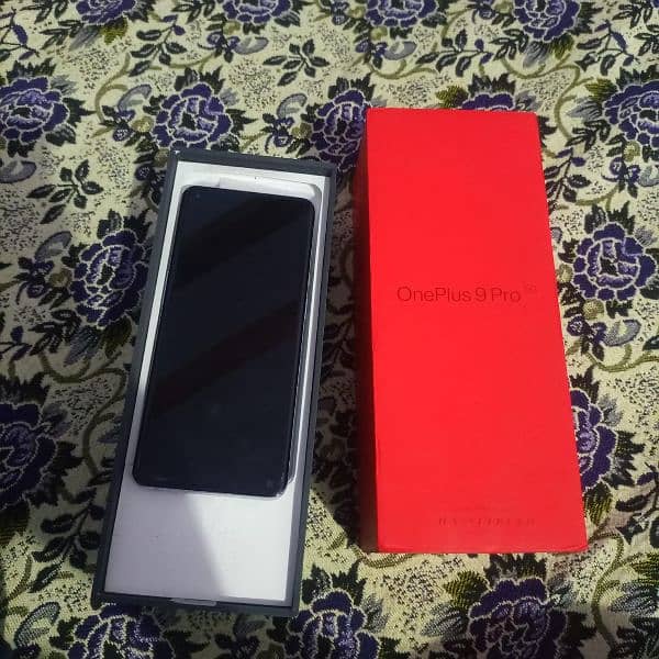 OnePlus 9pro 5G with box & original charger Minor dotted 1