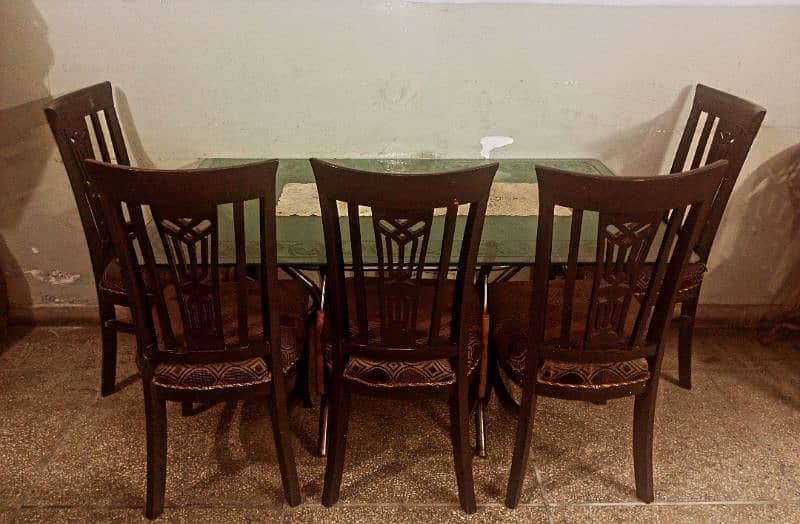 Dinning glass table with solid 5 wooden chairs. 2