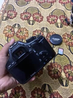 canon 550D camera with 18/55 lens and sd card