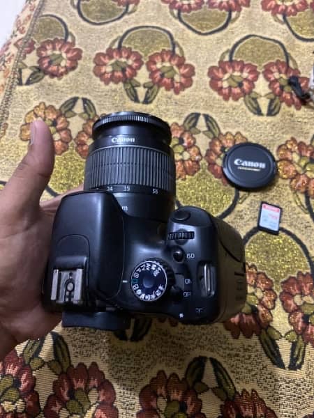 canon 550D camera with 18/55 lens and sd card 1