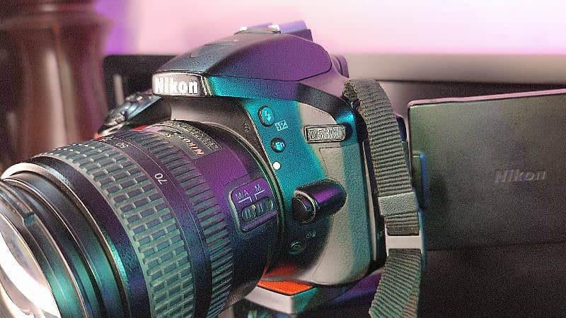 Nikon D5300 with two lenses Nikon 18-70mm and Tamron 70-300mm 4
